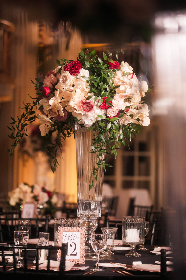 wedding table with tall vase