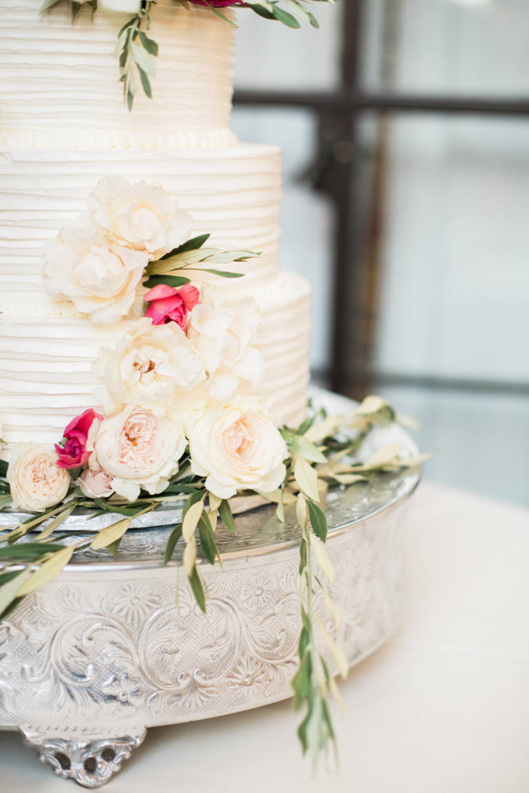 wedding cake on silver stand