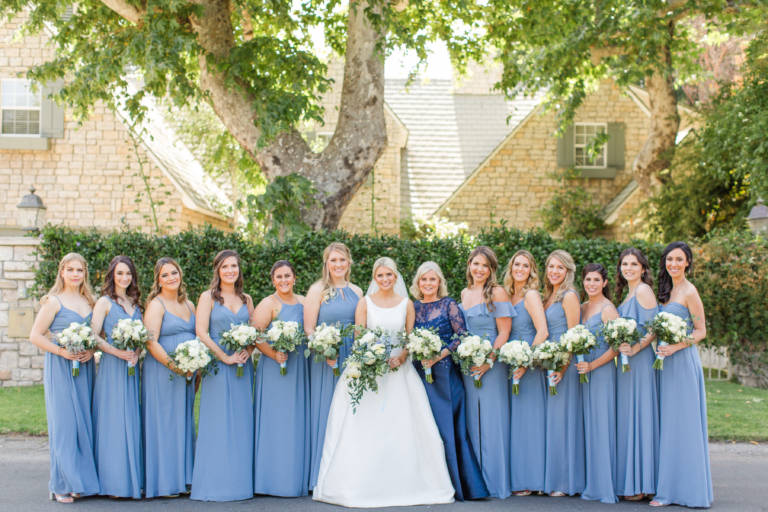 bride with bridesmaids in blue